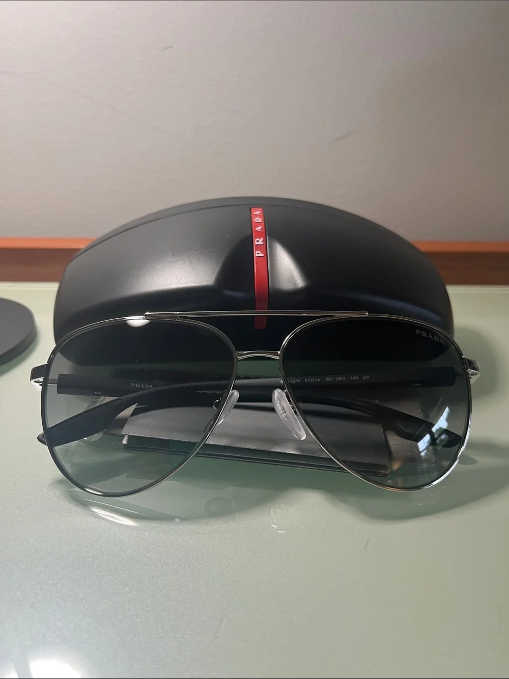 Prada Lina Rossa SPS 52W Silver Aviator Sunglasses with Black/Grey Lenses